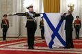 Прикрепление ордена Ушакова Президентом РФ В.В. Путиным на флаг ТАКР «Адмирал флота Советского Союза Кузнецов». 23 февраля 2018 года