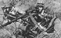Немецкие десантники на позиции с пулеметом MG-34.