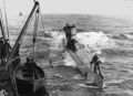 Подводная лодка тип VII-B во время боевого похода принимает груз