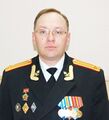 Подполковник Юрий Николаевич Савичев с юбилейным знаком «45 лет Радиостанции ВМФ «Антей»»