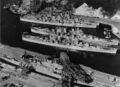 Йокосука, Япония. Март 1955 г. Cверху вниз USS Helena CA-75, USS Рочестер CA-124, USS Лос-Анджелесе CA-135, USS Toledo CA-133, USS Princeton CV-37.