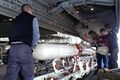 Загрузка ракеты на самолёт