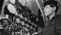 Моторист подводной лодки К-22 старший краснофлотец Василий Зиновьевич Рубцов (1918—1943) у поста управления дизелями, 1942 год.