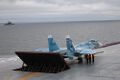Су-33 (борт.№ красный 87) на стартовой позиции ТАКР «Адмирал Кузнецов»