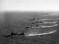 Корабли TF.11 в боевой формации, 8 июля 1942. От ближнего к дальним: USS Astoria CA-34, Vincennes CA-44, Mineapolis CA-36, New Orleans CA-32 и 6 эсминцев