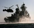 Ка-27ПЛ над ракетным крейсером «Варяг» при визите в Сан-Франциско, 2010 год