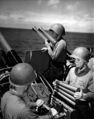 Перезарядка счетверенного автомата Bofors крейсера USS Alaska. Иводзима, 5 марта 1945 г.