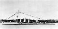 HMS Aurora с флагами расцвечивания вскоре после прибытия в Канаду.