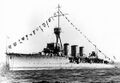 HMS Aurora с флагами расцвечивания вскоре после прибытия в Канаду.