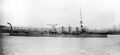 Легкий крейсер HMS Cleopatra покидает верфь Cammell Laird.