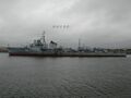Вид на левый борт эсминца Changchun в порту г. Рушань