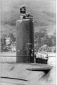 Подводная лодка HMS Conqueror возвращается в базу под «Весёлым Роджером»
