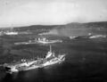 Авианосец поддержки HMS Unicorn, линейный крейсер HMS Renown, авианосец HMS Illustrious (справа) в Тринкомали, Шри-Ланка, 1944 г.