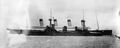 Линейный крейсер HMS Indefatigable рядом с лайнером RMS Olympic.