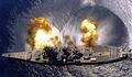 Бортовой залп линкора USS Iowa из девяти 406-мм и шести 127-мм орудий. Пуэрто-Рико, 1 июля 1984 г.