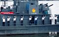 «Знак Ордена Красного знамени Трёх Великих Революций» на рубке северокорейского корабля типа Taechong II.