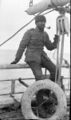 Мортон Мойес (англ. Morton Henry Moyes; 1886–1981) на палубе паровой яхты «Аврора» (Aurora) в 1911 году