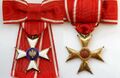 Офицерский крест Ордена Возрождения образца 1921 года на ленте для дам. Аверс и реверс