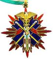 Знак II и III класса ордена Золотого коршуна. Аверс.