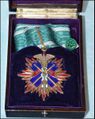 Знак III класса ордена Золотого коршуна в наградной коробочке.