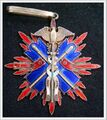 Знак II и III класса ордена Золотого коршуна. Аверс.