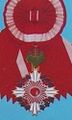 Звезда и знак ордена Восходящего солнца с цветами павлонии на Большой ленте.