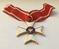 Командорский крест Ордена Возрождения образца 1944 года на ленте. Аверс