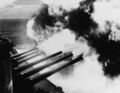 Линкор USS South Dakota ведет огонь главным калибром по заводам Kamaishi Steel Works. Хонсю, 14 июль 1945 г.