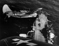 SBC2C-3 над USS Hornet перед заходом на посадку