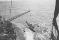 Подъем самолета Vought OS2U Kingfisher на борт USS Chester. Февраль 1945.