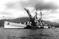 Погрузка боезапаса на CL-52 Juneau во время операций в Корее, июль 1950 года