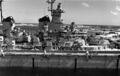 Носовая надстройка и возвышенная 406-мм башня USS Wisconsin, стоящего в притопленном доке USS AFDB-1. Гуам, 5 апреля 1952 г.