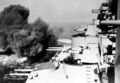 Линкор USS Wisconsin ведет огонь по ж/д тоннелю. Корея, середина марта 1952 г.