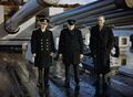 Джон Тови, Уинстон Черчилль и Стаффорд Криппс на борту линкора HMS King George V, Скапа Флоу, 11 октября 1942 года